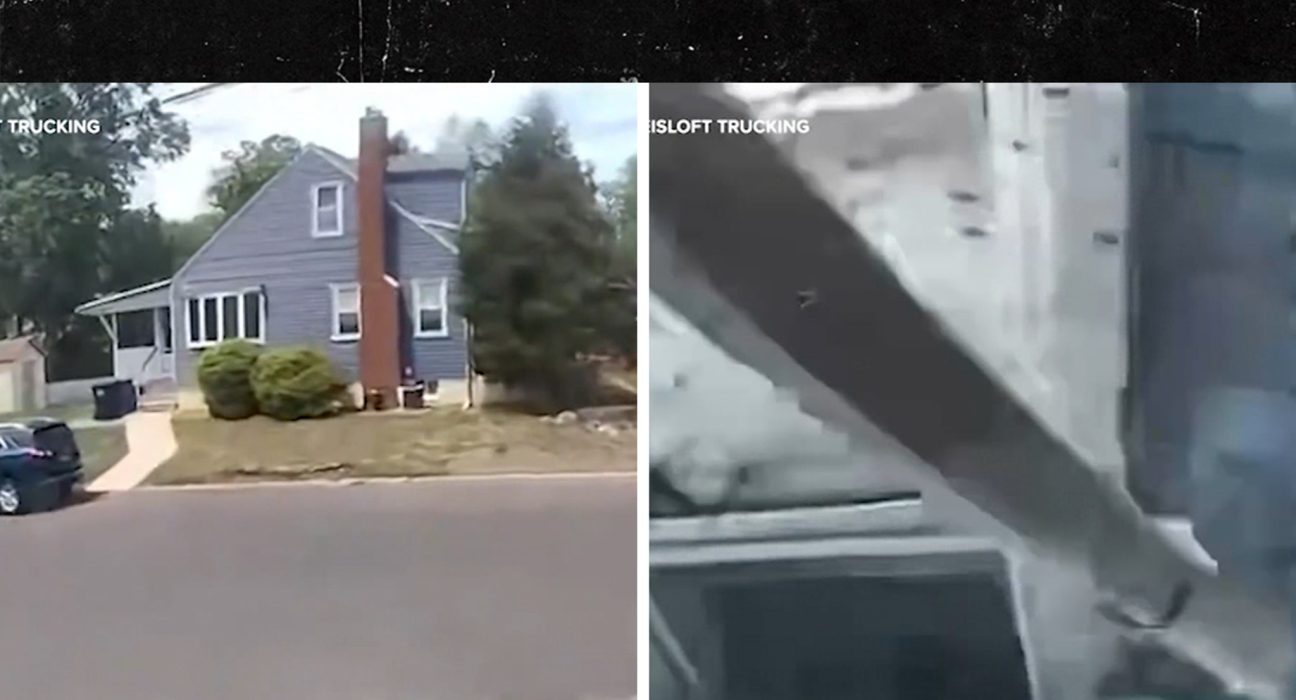 A máquina de caminhões lida com a cidade ao redor da casa da cidade, no vídeo, um vídeo