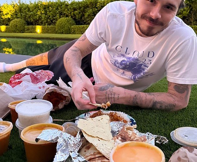 Nicola Peltz compartilha o tributo ao marido Brooklyn Beckham porque eles desfrutam do acolhedor piquenique no meio dos tumidos de seus pais antes da crescente disputa
